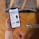 Woman's hands browsing products on a smartphone shopping application