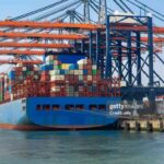 Large gantry cranes and container ship - port of Rotterdam - Maasvlakte
