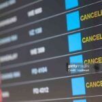 Departure flight board with cancelation at the Airport.