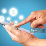 Making money with online business concept with blue background