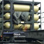 Rack of gas containers on heavy truck running on CNG