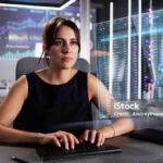 Analyst Working With Spreadsheet Business Data On Computer