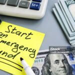 Start an Emergency Fund. Money and calculator.