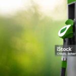 Biofuel filling station on a green background. Bio fuel concept