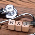 HSA Health Savings Account Wooden Blocks Near Stethoscope On Wooden Table