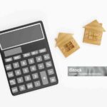 Calculator and two wooden houses icons. 3d illustration