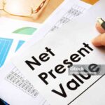 Net present value NPV documents on a table.