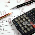 Scientific calculator, Pen and Pencil over the Engineering Drawing Map