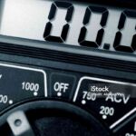 Electronic digital voltmeter with zero reading close up.