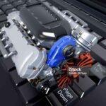 The car's engine on a laptop.