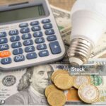 Cost of electric utilities with light bulb for payment.