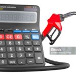 Calculator with fuel pump nozzle, 3D rendering isolated on white background