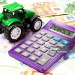 A tractor, money and a calculator