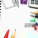School office supplies on white background