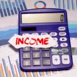 word income spelled on dice
