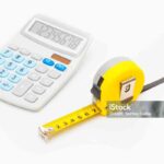 Yellow ruler and calculator - measurement and calculating instruments