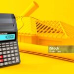 House development background with calculator in orange color. 3d illustration