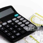 Photo of the Architectural project, pair of compasses, rulers and calculator